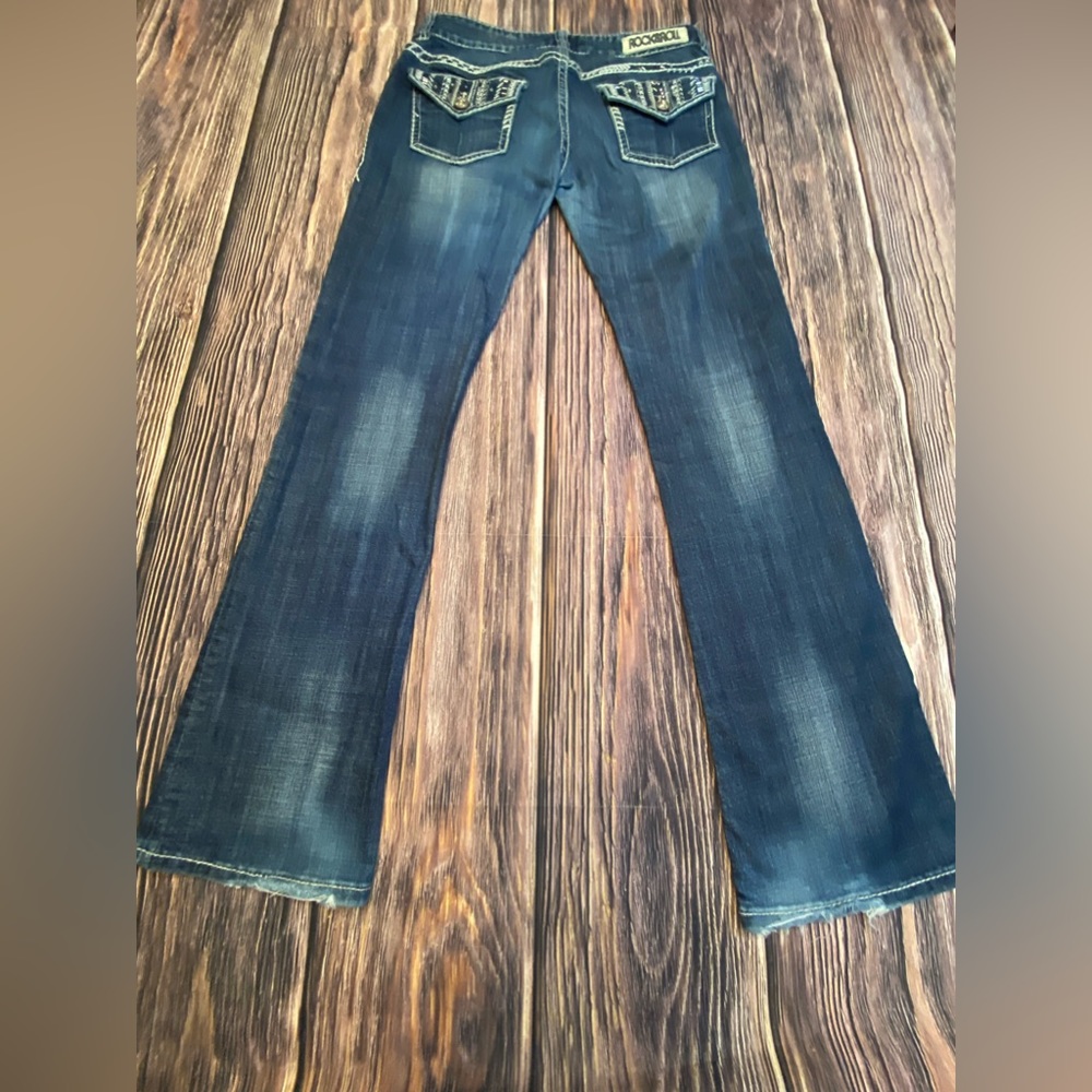 Rock & Roll Cowgirl Original Low Rise 29x34 Missing gems on back Frayed hems.